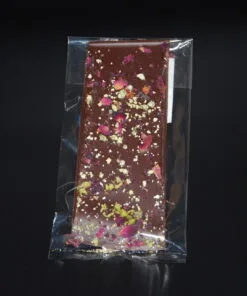 Maracaibo-Bruch (65% Kakaoanteil) mit Orangenöl, Pistazien und getrockneten Rosenblüten, 50g