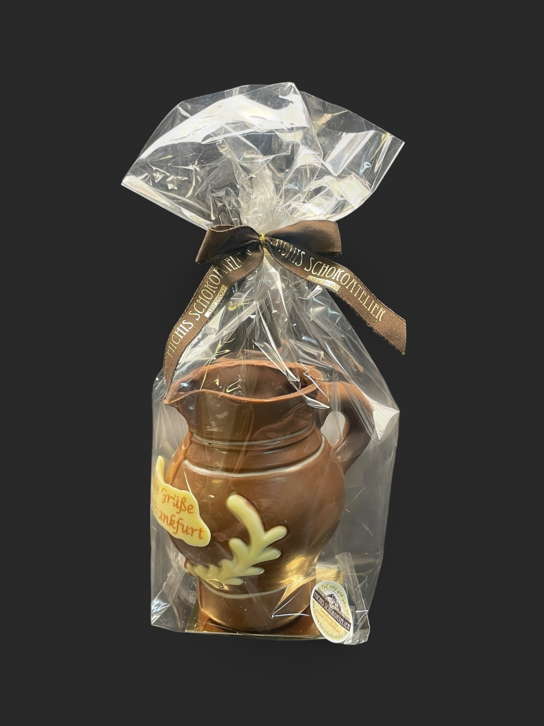Bembel-Figur aus Vollmilchschokolade (40 % Kakao), mit Aufschrift „herzliche Grüße aus Frankfurt“, Seitenansicht, in Geschenkverpackung