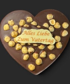 Schokoladenherz aus Zartbitterschokolade (65 % Kakao), mit Aufschrift „Schokoherz flach Vatertag Haselnüsse“