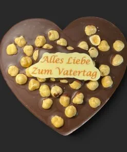 Schokoladenherz aus Zartbitterschokolade (65 % Kakao), mit Aufschrift „Schokoherz flach Vatertag Haselnüsse“