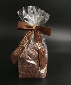 Caramelized cocoa nibs packaged in cellophane bags