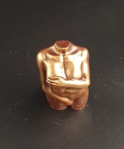 Weiblicher Torso aus Zartbitter-Schokolade mit Bronze-Pulver