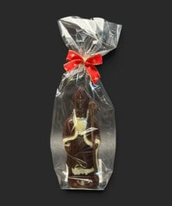 Kleiner Bischof mit Stab aus Zartbitterschokolade, verpackt – handgefertigt in Michis Schokoatelier.