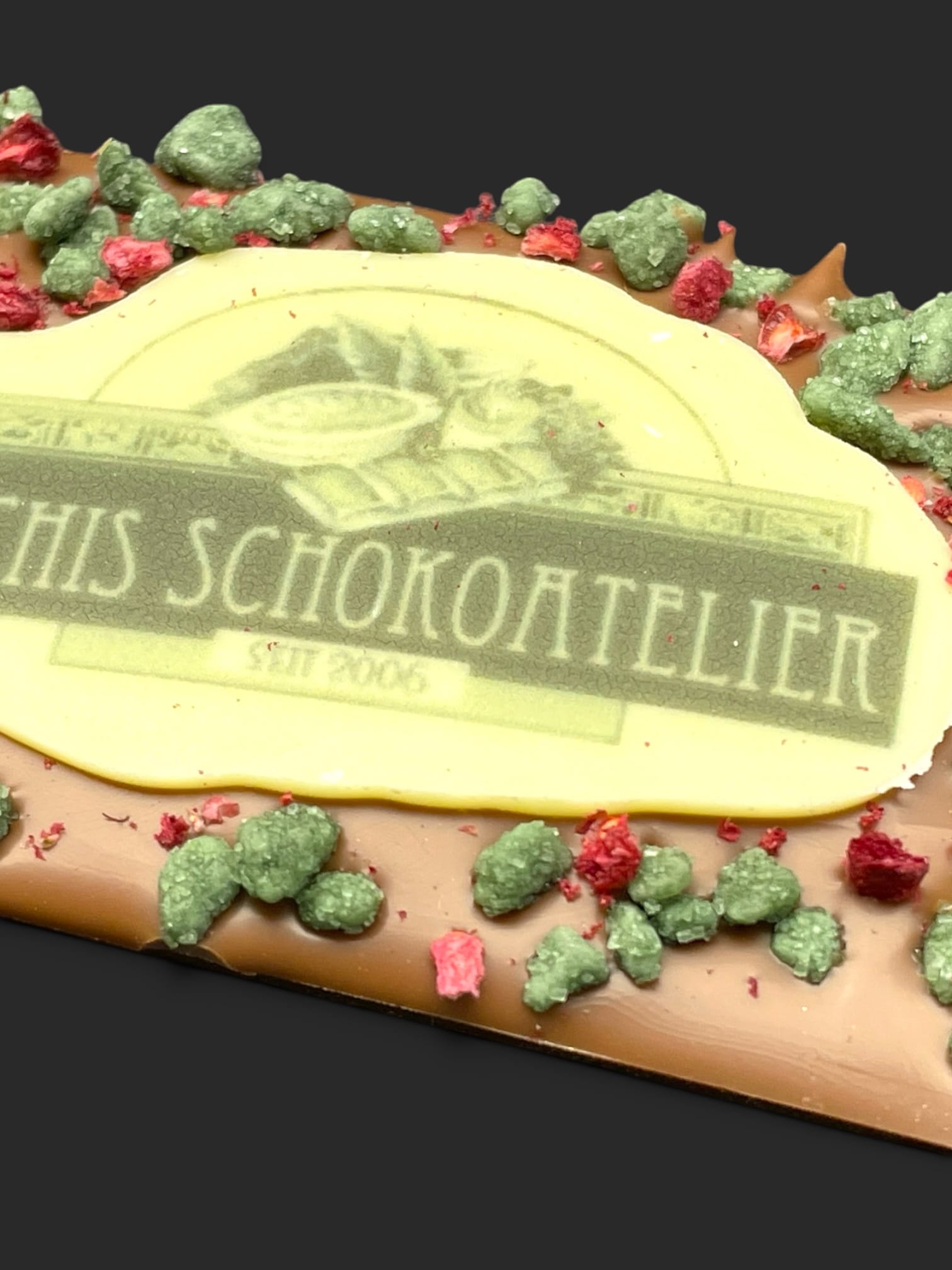 Mini-Schokoladentafel aus Vollmilchschokolade (40 % Kakao), mit Aufschrift „Minitafel LOGO“, Detailansicht
