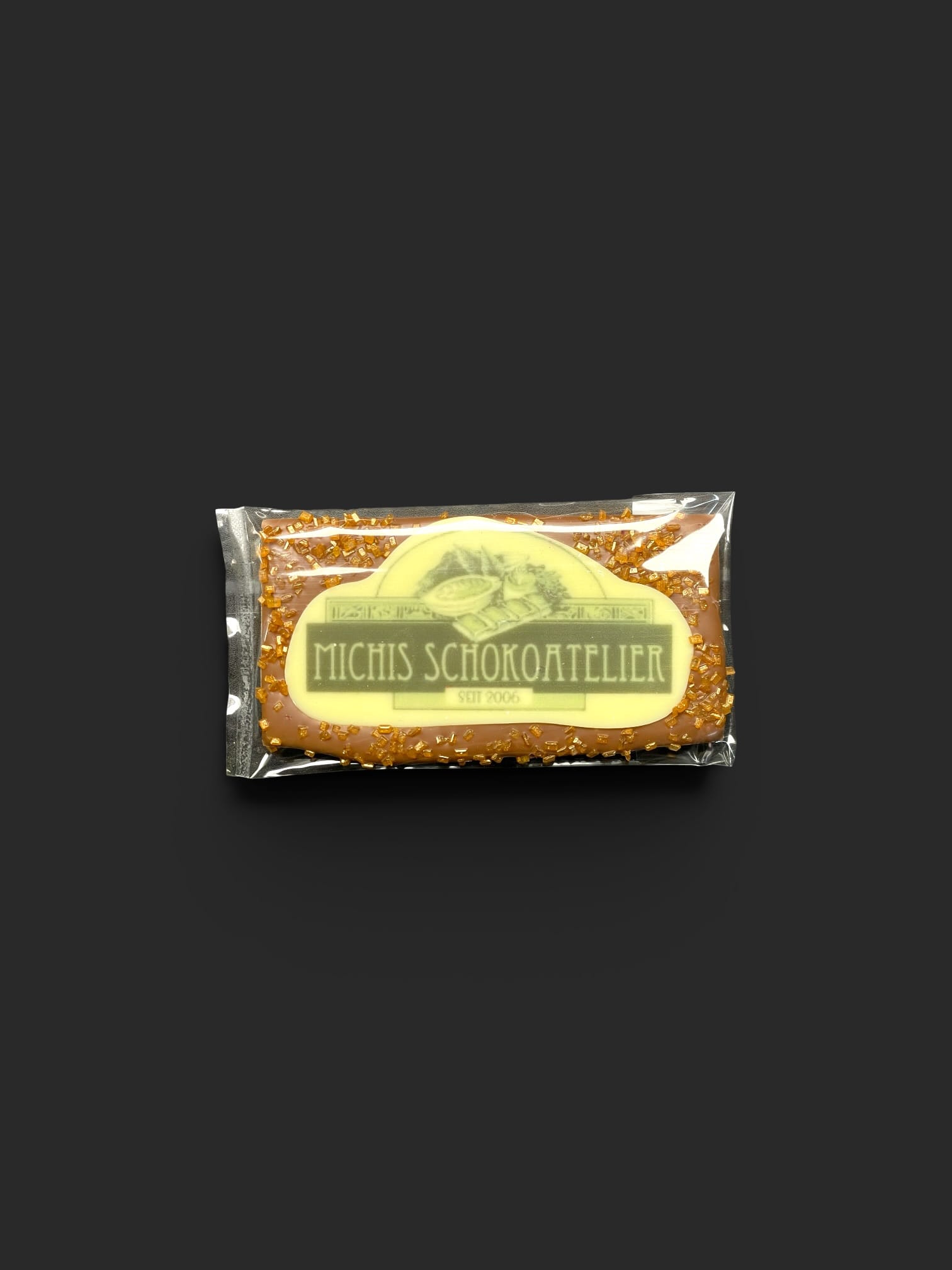 Mini-Schokoladentafel aus Vollmilchschokolade (40 % Kakao), mit Aufschrift „Minitafel Zuckerstreusel LOGO“, in Geschenkverpackung